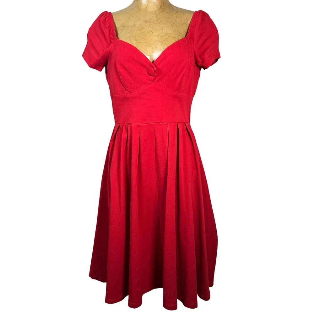 unique vintage dresses Black Criss Cross Halter Rita Flare Dress up style that seamlessly blends 1950s glamour with modern sensuality Unique Vintage Black Trim Lamar